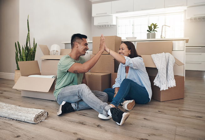 happy couple in new home