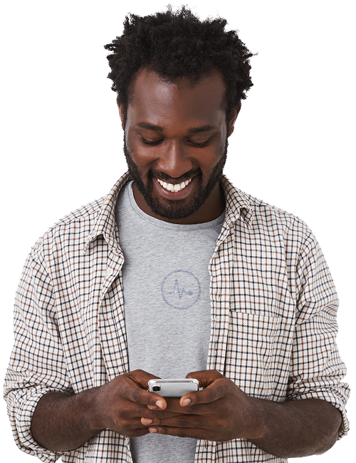 a guy on his phone smiling at his newly improved credit score